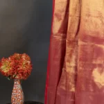 Phulia – Handwoven Coral Pink Raga Tissue Silk Saree